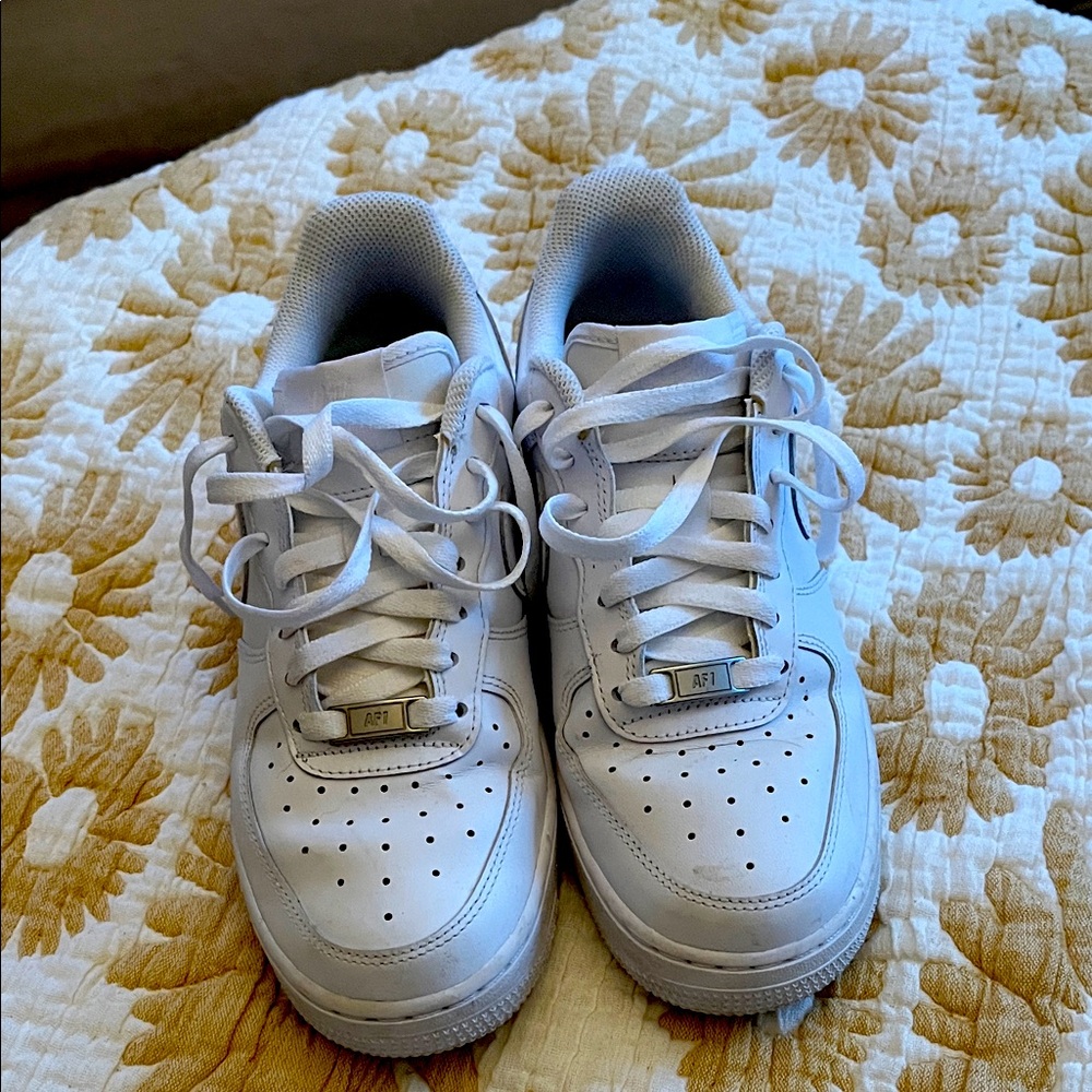 These are Womens. Not kids. Nike Air Force ones.